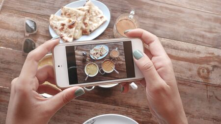 Food photo of indian food on wooden table for social networksの写真素材