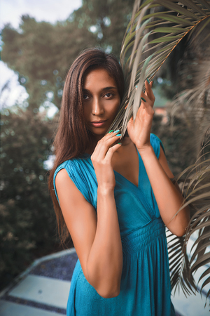 Beautiful sexy woman with fresh health skin in gardenの写真素材