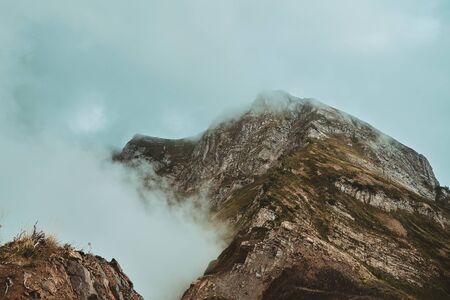 High mountains in the cloudsの写真素材