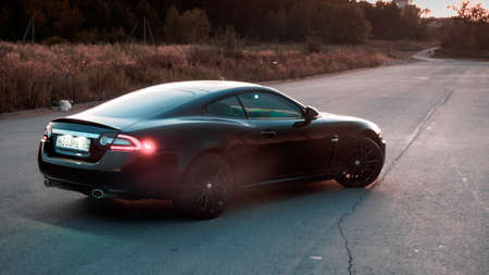 Moscow, Russia, September 15 2017, Illustrative editorial shot of Jaguar XK Coupe in sunset lightのeditorial素材
