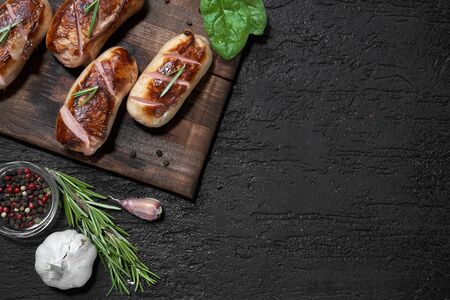 grilled sausages on the boardの写真素材