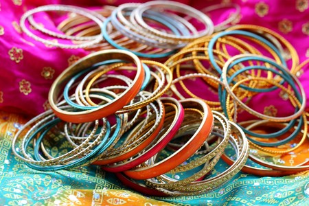 Indian bracelets on beautiful shawl. Indian fashionの写真素材