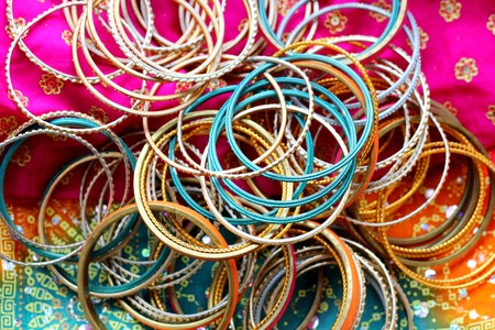 Indian bracelets on beautiful shawl. Indian fashionの写真素材
