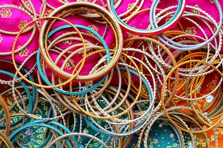 Indian bracelets on beautiful shawl. Indian fashionの写真素材
