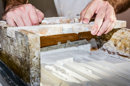 Craftsmen made plaster moldings on the traditional method