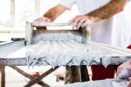 Craftsmen made plaster moldings on the traditional methodの写真素材