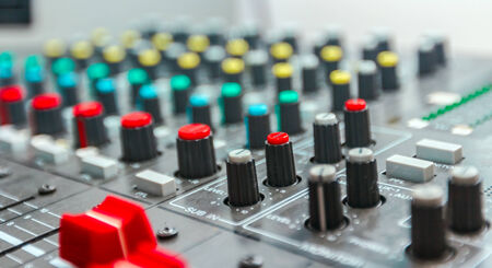 Sound studio adjusting record equipment, music mixerの写真素材