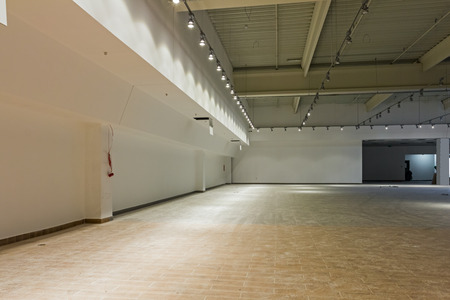 Interior of empty unfinished modern mega market. Architecture concept.