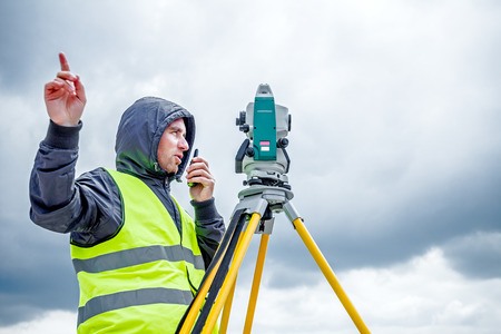 Zrenjanin, Vojvodina, Serbia - May 28, 2015: Surveyor engineer is measuring level on construction...