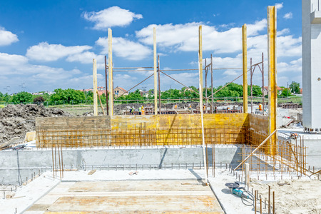 View on building site assembly a huge mold with reinforcement mesh for concretingの写真素材