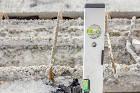 Construction tool, Bubble spirit level is used to control reinforced concrete.
