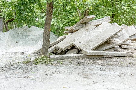 View on piles of concrete slabs in the park background.の写真素材