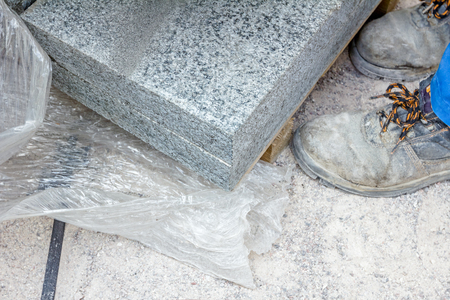 Above view on wooden pallet with paving slabs at building site ready for use.の写真素材