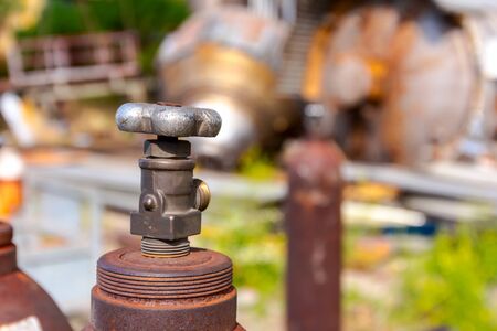 Used old and rusty welding gas tank, for cutting scrap metal with acetylene torch at junkyard.の写真素材