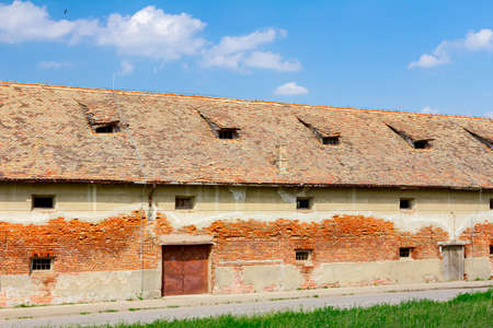 View on exterior of vintage abandoned storehouse.の写真素材