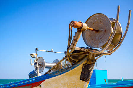 Close up shot of extraction fishing net mechanism on the fishing boat.の写真素材