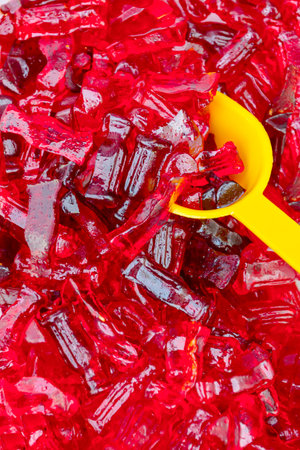 Various colored candies and sweets for sale placed in trays, available at flea market.の写真素材