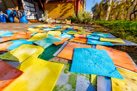 Colorful clean sponge cloths background, microfiber household disposable dust cleaning rags.