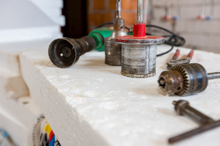 Several types of inserts tools, for precision drilling hole, saw with large diameter, drill in soft materials, brick, wood, plastic or plasterboard wall.の写真素材