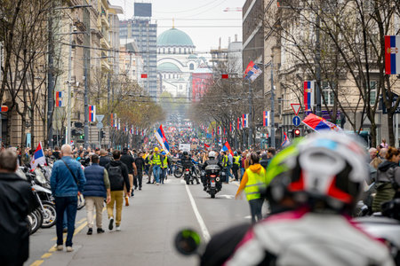 Belgrade, Serbia - March 15, 2025: Students, bikers, citizens protest against government corruption, regime, demand justice for 15 lives lost in tragic accident roof collapse, railway stationの写真素材