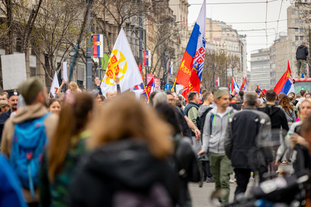Belgrade, Serbia - March 15, 2025: Students, citizens protest against government corruption, regime, demand justice for 15 lives lost in tragic accident roof collapse, railway stationの写真素材