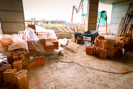 Blocks, different shape and size, various shape placed on floor at construction site.の写真素材