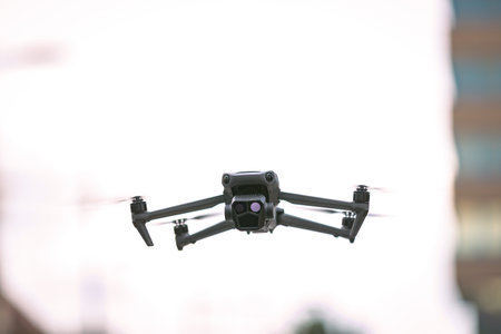 Drone quad copter is flying with digital camera of high resolution, videographer, digital technology...
