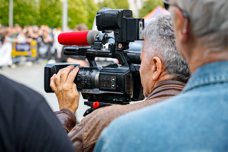 Professional video production, press concept of modern live broadcast, recording with digital camera...
