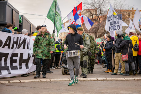 Zrenjanin, Serbia - January 25, 2026: Group of war veterans with berets at student's protest against government corruption, regime, demand justice for 16 lives lost in tragic accident roof collapseのeditorial素材