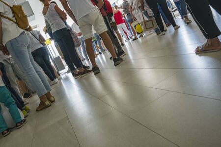 A group of people is indoors. Selective focus. Copy space.の写真素材