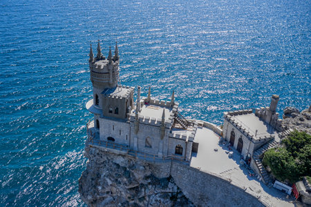Swallow's Nest castle on the edge of a steep cliff on the seashore. Shooting from the air.のeditorial素材