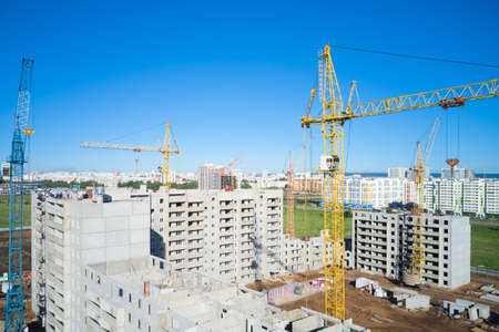 Mass construction of the district with panel multi-storey buildings. Shooting from a drone.の写真素材