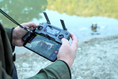 Russia, Sukko, September 17, 2021: the drone control panel with flight parameters in the hands of...
