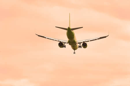 A departing civilian plane in the sky. copyspace.