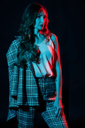 Girl illuminated by a turquoise filterの写真素材