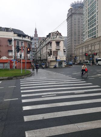 Shanghai street. Chinese road and modern buildings. May 2018.