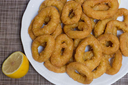 Plate of breaded squid rings. Roman-style squid rings