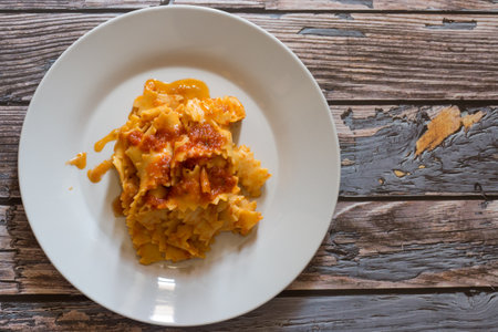 Homemade carrot pasta with flour and boiled carrots with vegetarian ragout.の写真素材