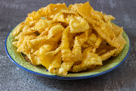 Carrot-flavored fried sheets. Dough of flour and boiled carrots, pulled with a pasta machine and...