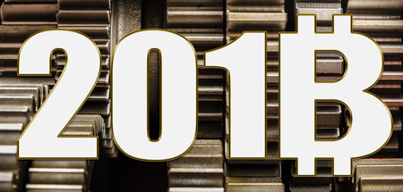 2018 bitcoin year against the background of gearsの写真素材