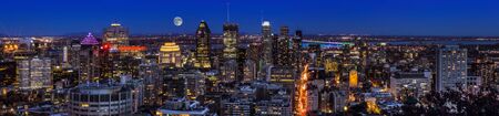 Amazing view of Montreal city at sunset with colorful neon light building.のeditorial素材
