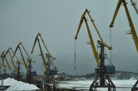 Berthing crane, container terminal crane in an industrial seaportの写真素材