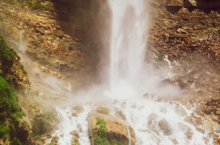 Waterfall on the background of rocks. Georgia.の写真素材