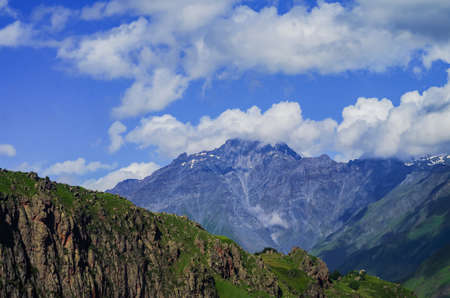 Summer mountains green grass and blue sky landscape