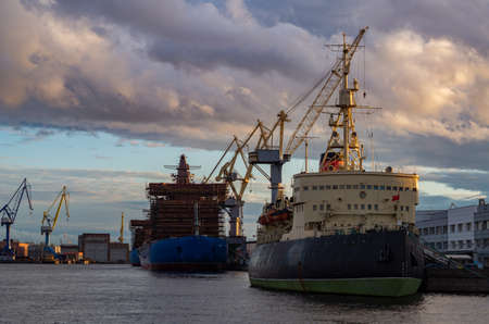 Shipyards at sunset in autumn.Shipbuilding in Russia.