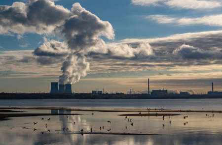 Nuclear power plant on the Bay, sunset. The concept of the peaceful atomの写真素材