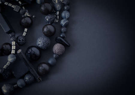 jewelry in boho style on a dark background. Copy space.Flat lay.の写真素材