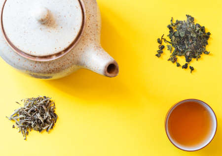 Freshly Brewed Green Tea in Cup. Healthy Drinks Detox Antioxidants Concept. Minimalist Flat Lay with Copy Space.の写真素材