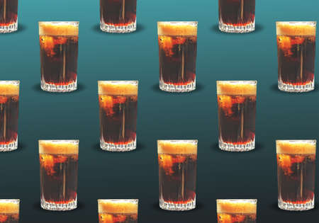 A glass of Cola with ice on a dark background. Seamless pattern with a refreshing drink. Gradient.の写真素材