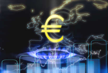 A gas burner and a growth chart with a euro sign. The blue flame of a gas stove on the background of a map of Europe. The concept of gas consumption in Europe.の写真素材